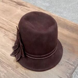 Brown 100% Wool Bucket Hat with Leaf Accent. In excellent condition